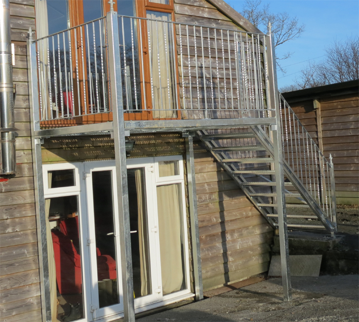 Galvanised steel balcony and steps