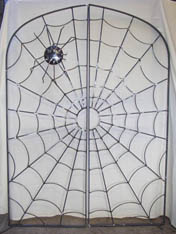 unique ironwork 'spider and web' design garden gate